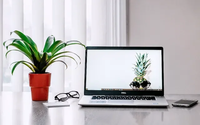 Laptop on a desk ready to bet